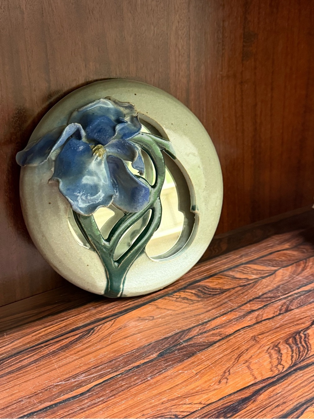 Studio pottery wall piece with flowering Iris bloom